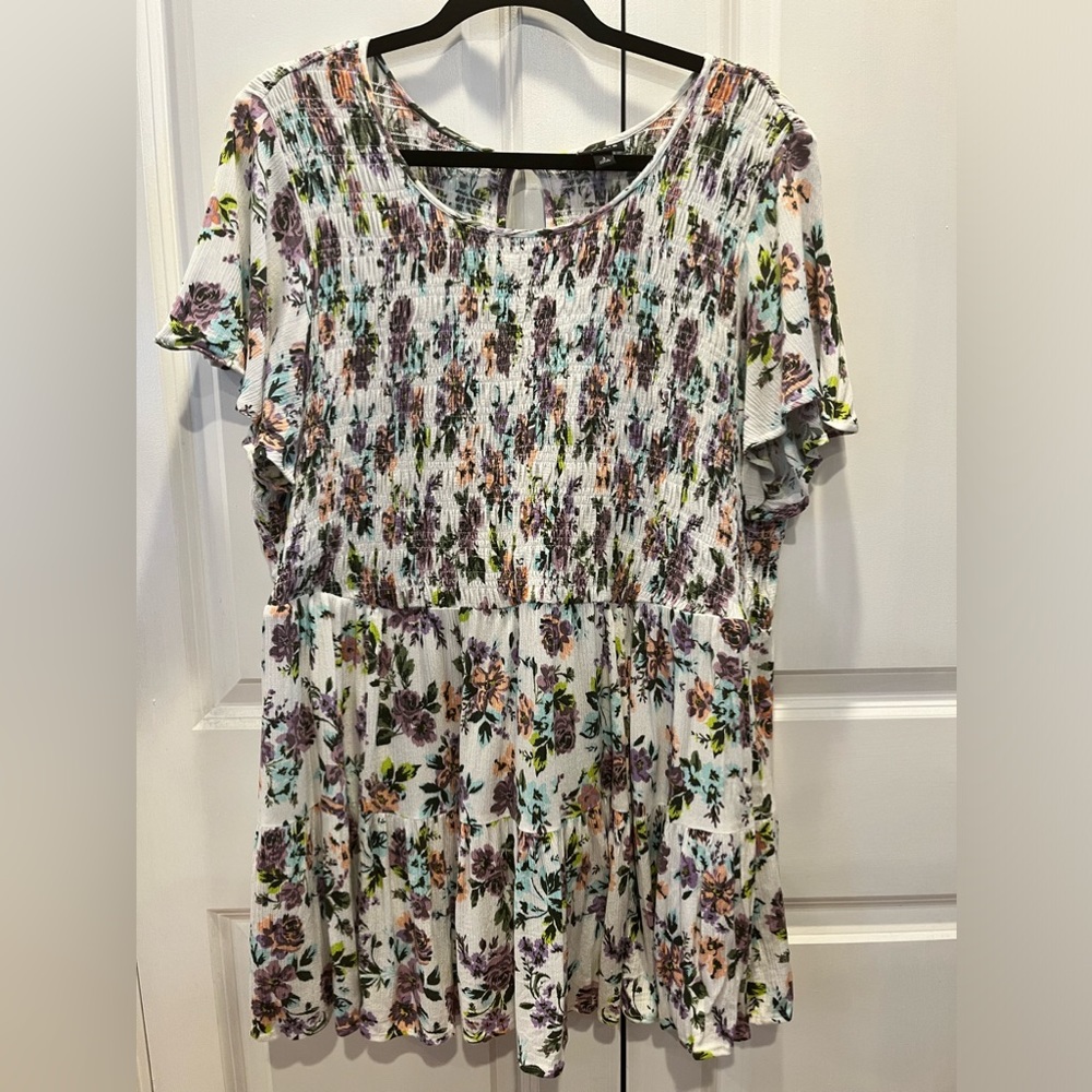 Torrid 3x babydoll tier multicolored top. Great condition. Never dried in dryer.